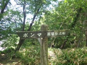 左へ